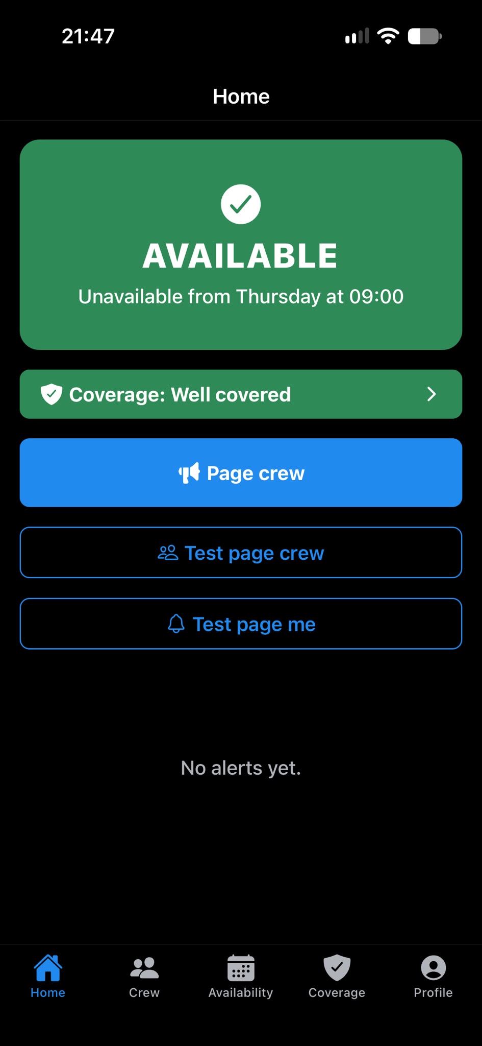 The Home screen. A green panel reads Available, unavailable from Thursday at 09:00. Below it are a Coverage: Well covered bar and buttons for Page crew, Test page crew and Test page me.